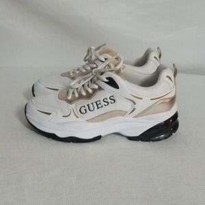 Guess White and Gold Athletic Tamaa Metallic Mesh Sneakers.